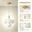 Suspension minimaliste en laiton à long cordon, lampe suspendue moderne à 4 lumières, globe blanc laiteux, idéale pour îlot de cuisine et table de chevet.