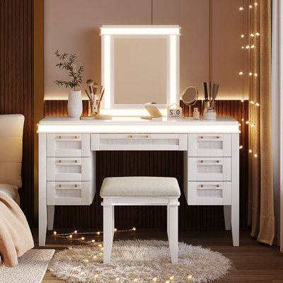 Vanity Desk With Mirror And LED Lights, 7-Drawer Makeup Station With Cushioned Stool And Hollow Design For Efficient Bedroom Organization.