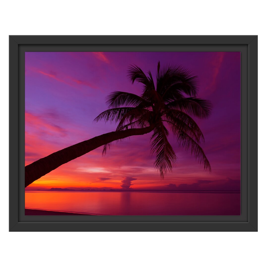 Gerahmtes Wandbild Palme am Meer mit Sonnenuntergang