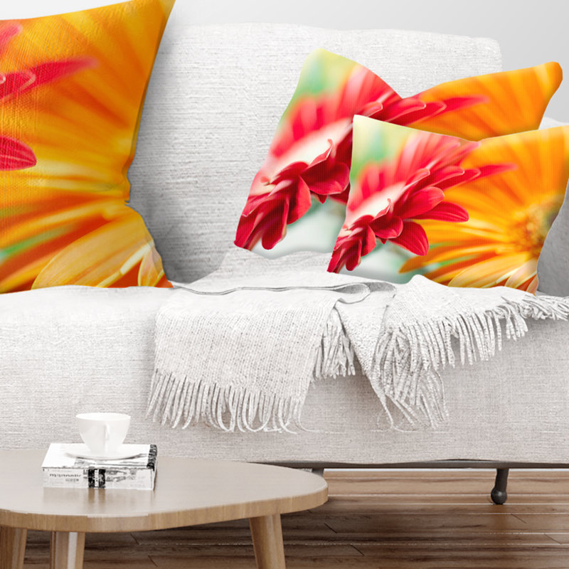 Coussin décoratif à imprimé floral rouge et jaune