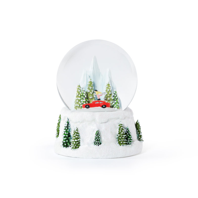 Boule à neige hivernale alpine, Skieur de voiture rouge