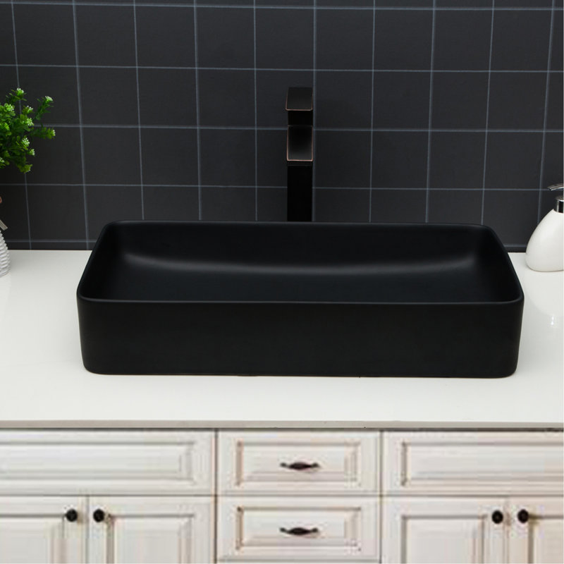Lavabo de salle de bain rectangulaire en céramique 24 po x 13,5 po d'inspiration européenne contemporaine, faible absorption d'eau, surface lisse, installation au-dessus du comptoir