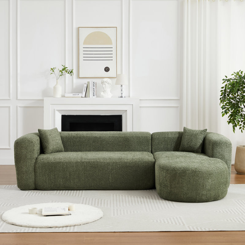 Canapé modulaire modulaire en L avec dossier incurvé, tissu chenille et confort moelleux pour les espaces de vie modernes.