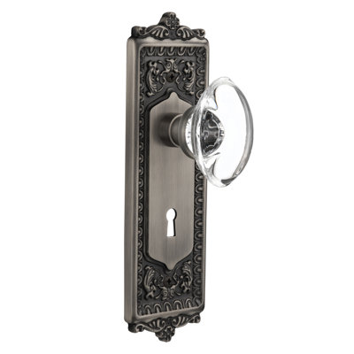 Egg & Dart Plate with Decorative Keyhole and Oval Clear Crystal Door Knob