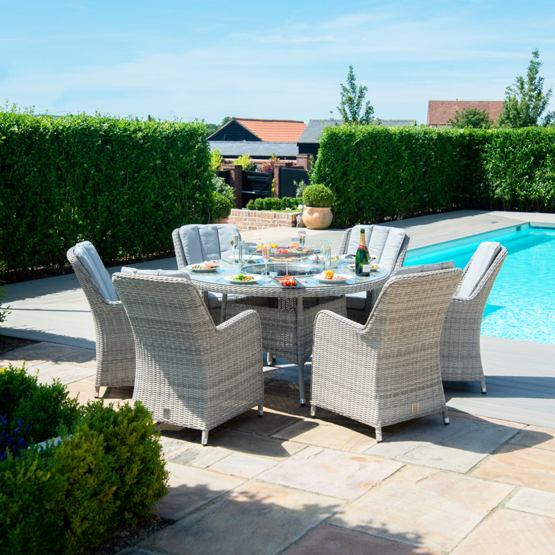 Balcom 6 - Person Patio Dining Set Umbrella Hole Included Round Table with Cushions Included