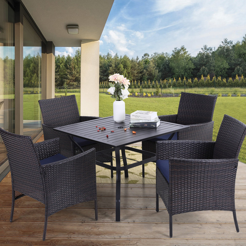 Leonard 4 - Person Patio Dining Set with Square Table , Cushions Included