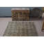 Tapis décoratif beige et brun à motif élégant pour rehausser le décor de votre salon