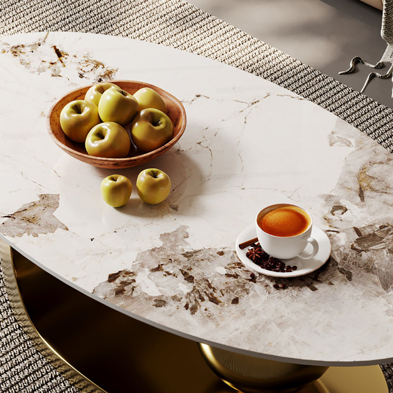 Table basse de luxe en pierre frittée ovale, plateau de table à effet marbré de L 51,2 po x l 27,5 po avec base en acier inoxydable doré poli et décor sphérique, centre de table glamour moderne pour le salon, résistant aux taches et aux égratignures