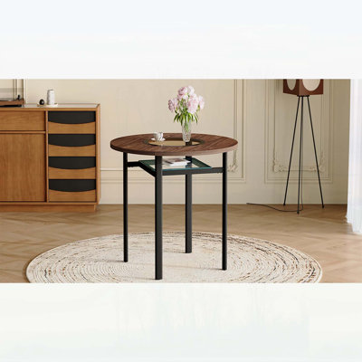 Table de salle à manger ronde moderne minimaliste de 42 pouces avec surface en grain de bois, incrustation en verre trempé, base en métal robuste et tablette inférieure intégrée pour une utilisation intérieure polyvalente.