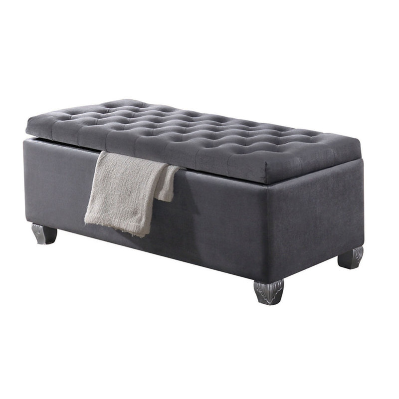 Banc de rangement gris capitonné