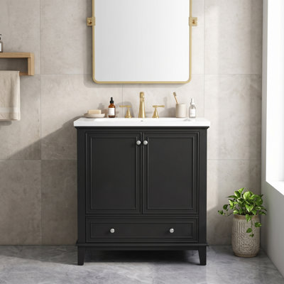 Meuble-lavabo autoportant à un lavabo, noir, avec dessus de lavabo en céramique intégré (robinetterie non incluse), dimensions : 51 cm (L) x 46 cm (P) x 86 cm (H).