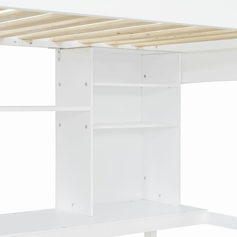 Lit mezzanine avec tablettes de rangement, bureau et échelle