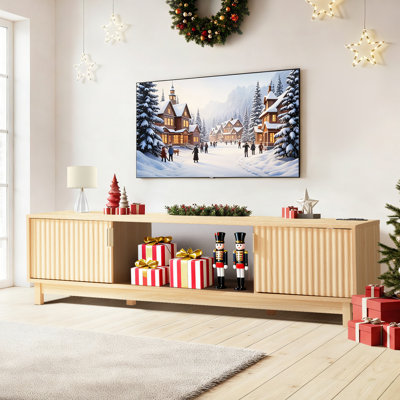 70" TV Stand with Fluted Doors and Built-In Power Outlet for TVs up to 75" by Ebern Designs