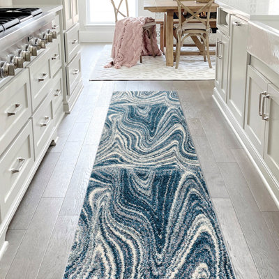 Tapis turquoise / crème Ledea