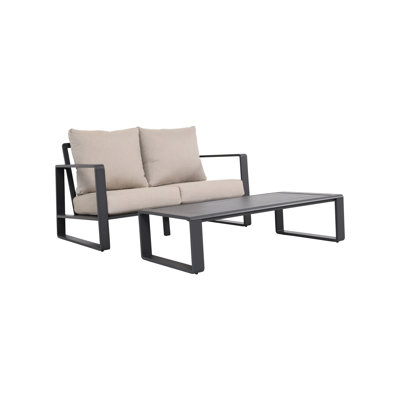 Table basse contemporaine en aluminium gris Jm 9017. Canapé confortable avec coussins, forme rectangulaire, polyvalente et idéale pour les appartements modernes.