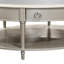Table basse, pierre frittée et finition champagne