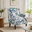 Fauteuil vintage avec garniture cloutée et tissu en lin
