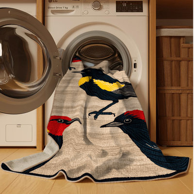 Tapis lavable à ailes noires