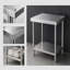 Bureau d'angle réversible en forme de L avec plateau coulissant pour clavier, idéal pour l'aménagement d'un bureau à domicile ou d'un espace de travail.-130778213