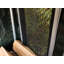 Abri en rondins vert en forme de pingouin-102796593