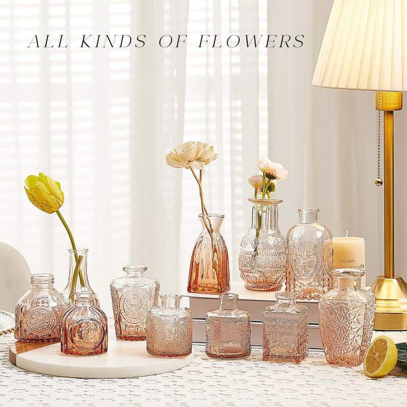 Ensemble de 24 vases en verre, Ambre