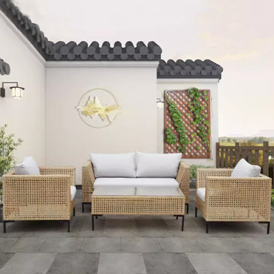 Brittini - Person Patio Conversation Set with Cushions
