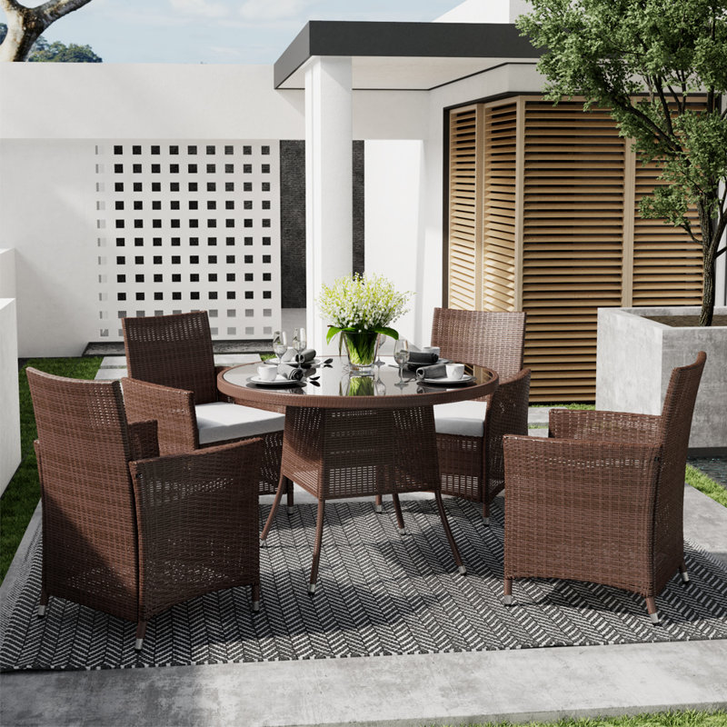 Kinchen Round Metal Outdoor Dining Table With Umbrella Hole , 105cm cm W 105cm cm D, Brown
