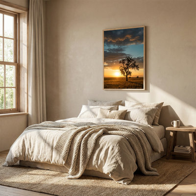 Art mural sur toile Lone Tree Silhouette in Golden Field With Dark Clouds