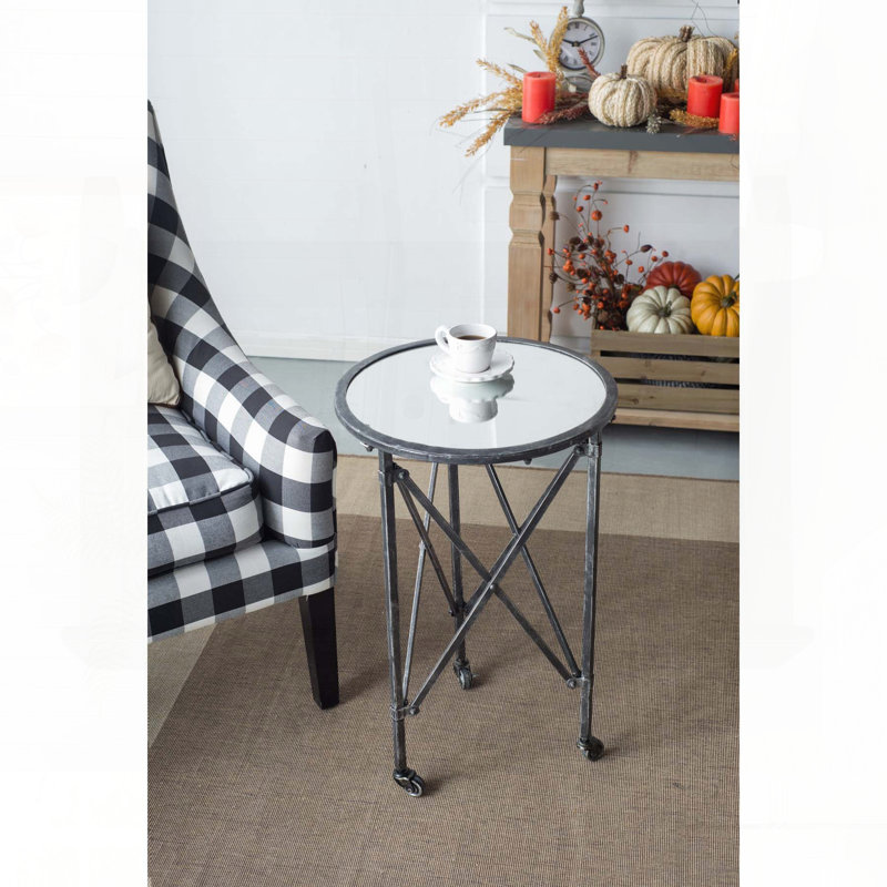 Table d'appoint ronde en verre avec cadre noir patiné et roulettes - Gilbert