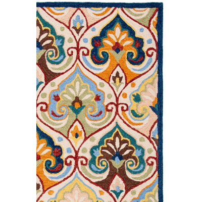 Tapis floral beige / bleu en laine / coton touffeté à la main Metro