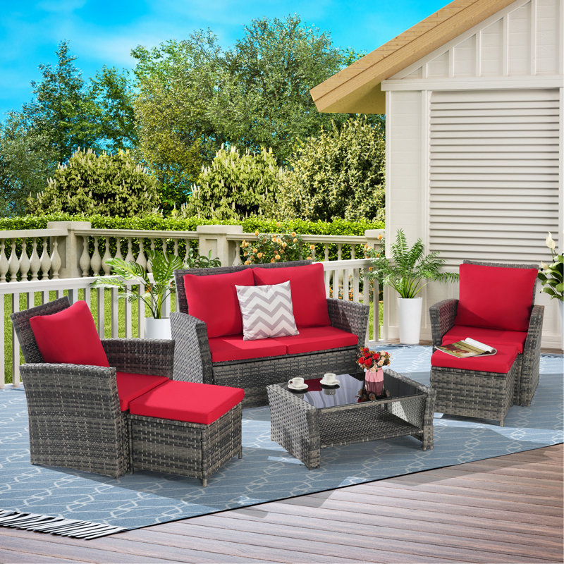 Ensemble de meubles de patio en osier 6 pièces avec repose-pieds et table basse en verre trempé, Rouge