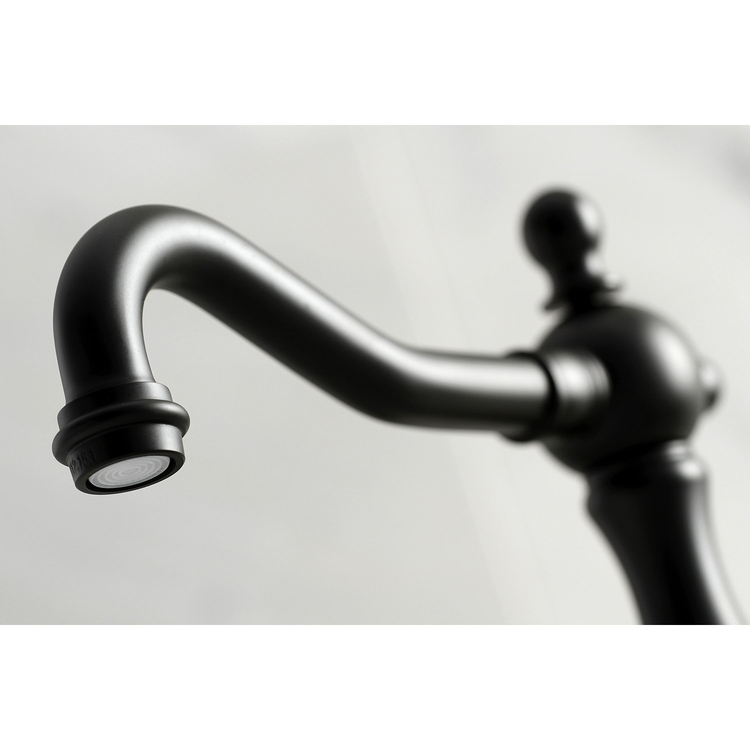 Kingston Brass Heritage Two-Handle 3-Hole Deck Mount Widespread Bathroom Faucet with Brass Pop-Up Drain, Matte Black/White