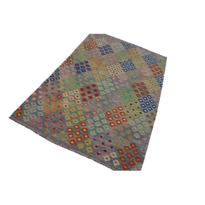 Madee Geometric Handmade Rectangle 6'6" x 9'9" Wool Area Rug in Gray/Green/Blue