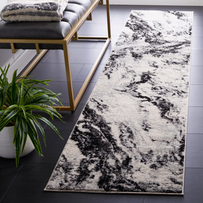 Dwana Machine Woven Abstract Area Rug