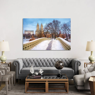 Central Park Snow On Bow Bridge, New York City by Susanne Kremer - Wrapped Canvas Print