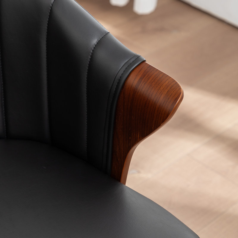Chaise de salle à manger rembourrée en similicuir Devault, Noir