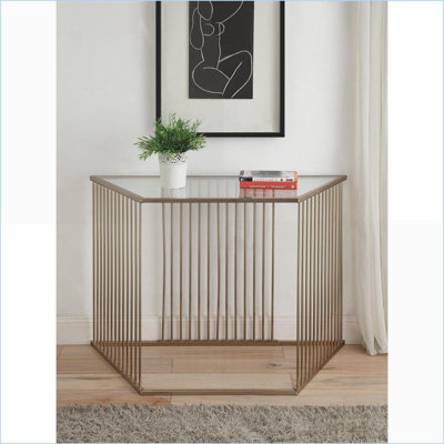 Table basse trapézoïdale à plateau en verre transparent avec finition champagne - Centre de table de salon contemporain