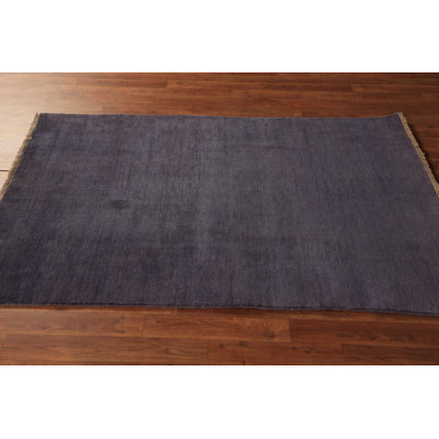 Tapis mauve en laine Gabbeh