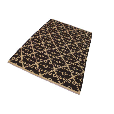 Madee Geometric Handmade Rectangle 7' x 9'7" Wool Area Rug in Tan/Black