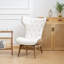Fauteuil à oreilles capitonné Lexey-1751323275