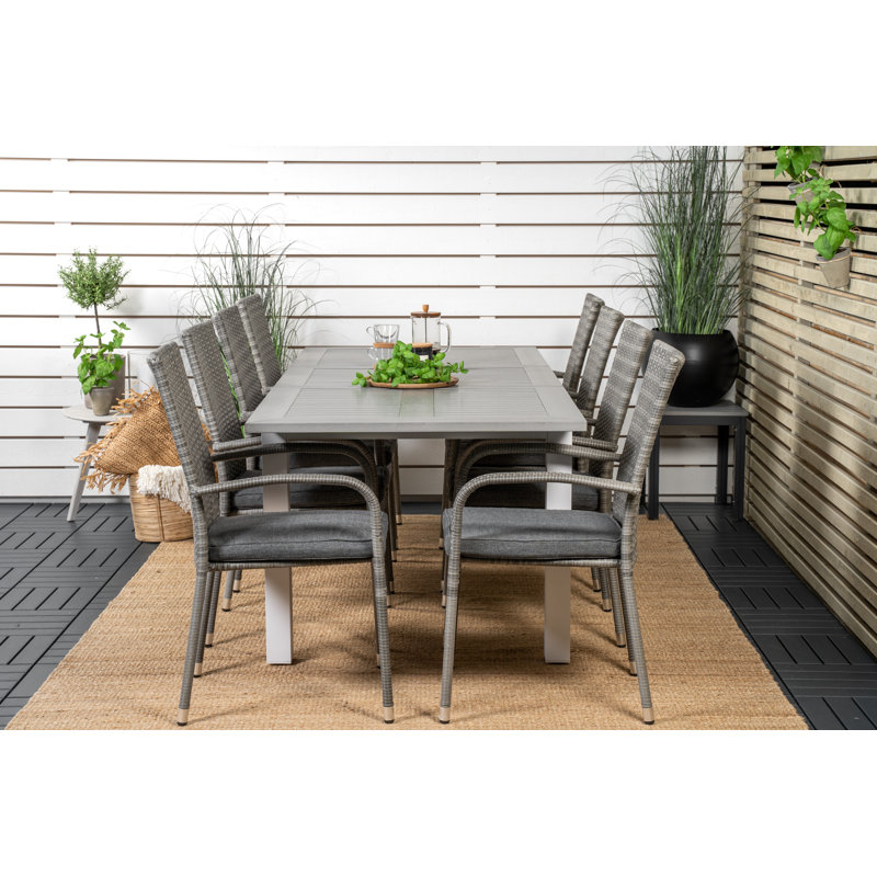 Jayesh 8 - Person Patio Dining Set with Extendable Rectangular Table , Cushions Included