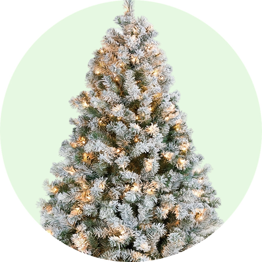 Lit flocked artificial Christmas tree.