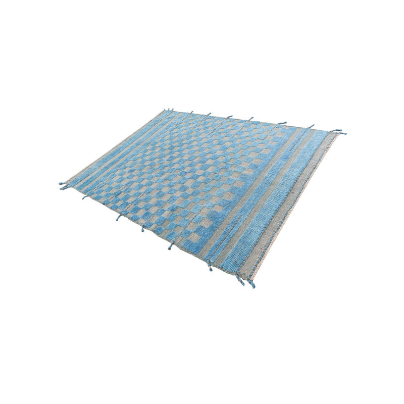 Tapis bleu Kalmanovitz