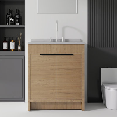 Meuble-lavabo autoportant de 76 cm (30 po) en contreplaqué avec comptoir et dosseret en marbre reconstitué, lavabo en céramique avec trop-plein, portes à fermeture amortie, gris