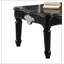Table basse noire avec pieds tournés
