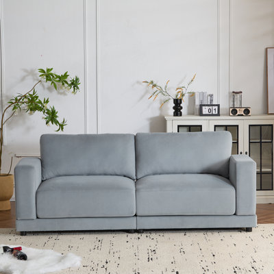 Canapé moderne avec coussins moelleux et fabrication robuste pour un confort ultime
