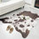 Ganote Animal Print Faux Cowhide Area Rug