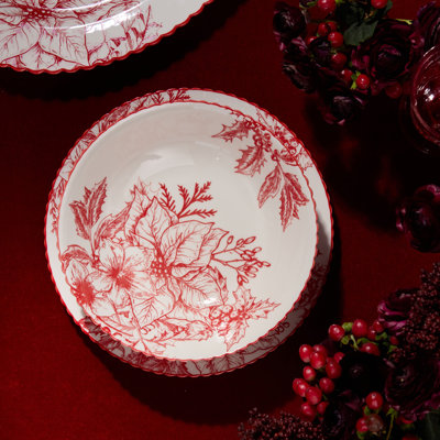 Crimson Noel Set of 6 Soup Bowls — Six assorted 48-ounce white porcelain bowls in dramatic crimson toile, delivering bold botanical beauty to every warming soup and stew of the season.