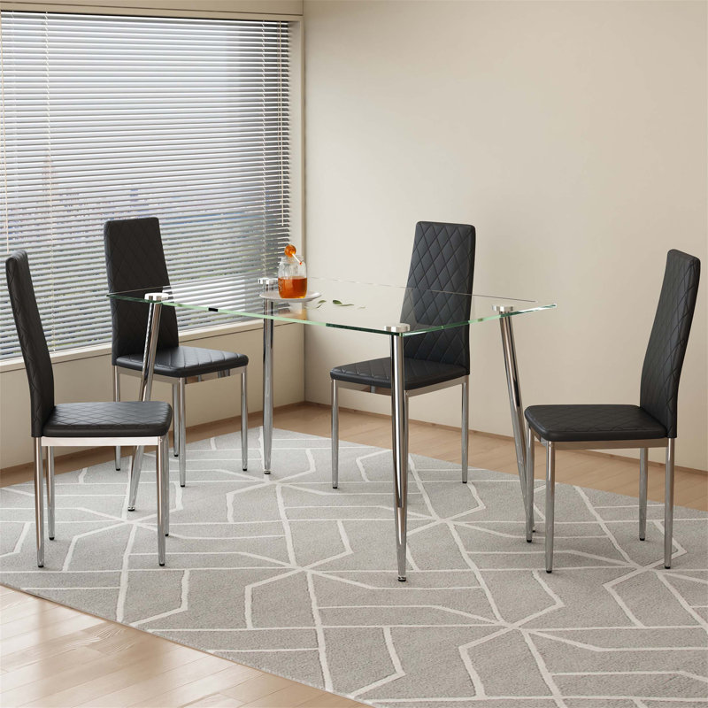 Table de salle à manger moderne et minimaliste moderne en verre avec 4 chaises à carreaux à haut dossier, durable et élégante pour toute maison.