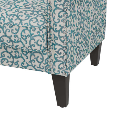 Le fauteuil d'appoint Barnet au motif de vigne bouclée avec des pieds en bois massif allie confort, durabilité et design élégant pour toute maison.